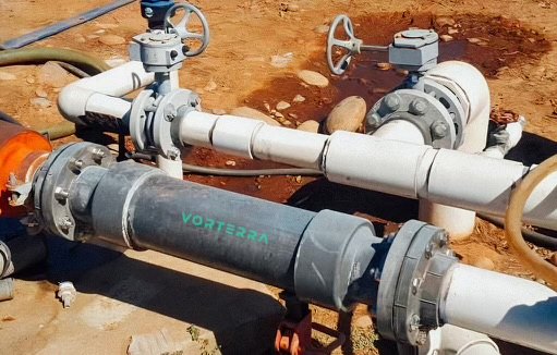 Vorterra-branded unit tied into a field manifold with valves